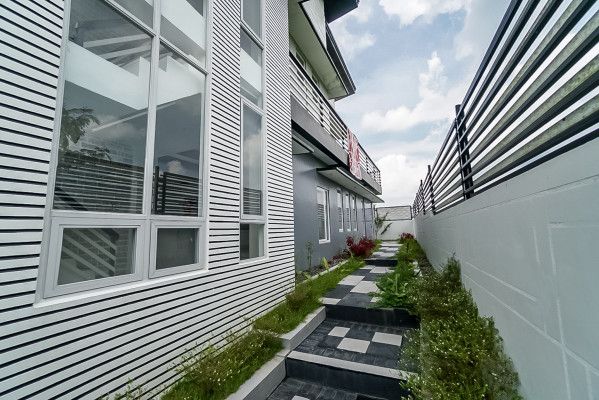 5bedroom house standing on a 432sqm lot features an impressive facade