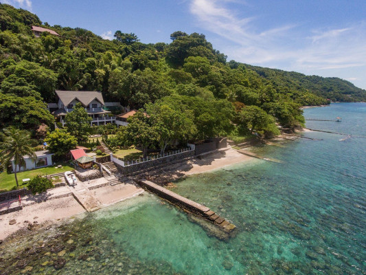 An Astounding White Beachfront Resthouse for Sale in Batangas