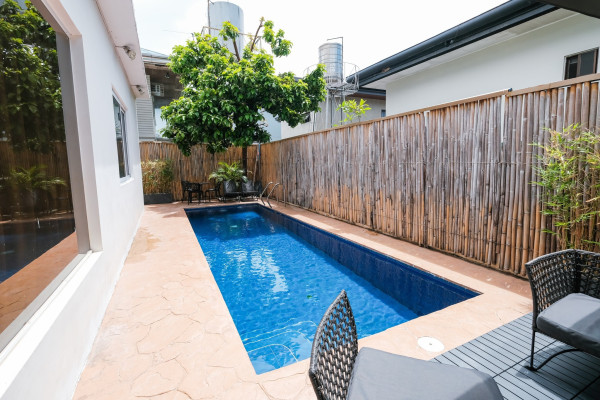 Own this Spacious 5-Bedroom Home with Pool