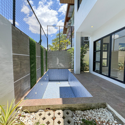 Picturesque Modern Tropical House and Lot For Sale in Vista Real Classica, Quezo