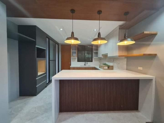 A sophisticated home in a secured subdivision that offers good amenities