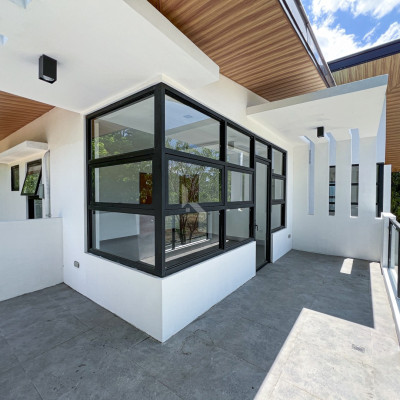 Picturesque Modern Tropical House and Lot For Sale in Vista Real Classica, Quezo