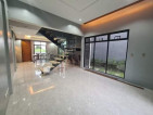 A sophisticated home in a secured subdivision that offers good amenities