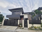 A sophisticated home in a secured subdivision that offers good amenities
