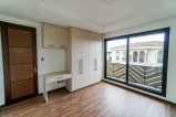 Brand new top-end house and lot with elevator located in McKinley Hills Village