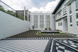 5bedroom house standing on a 432sqm lot features an impressive facade