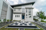5bedroom house standing on a 432sqm lot features an impressive facade