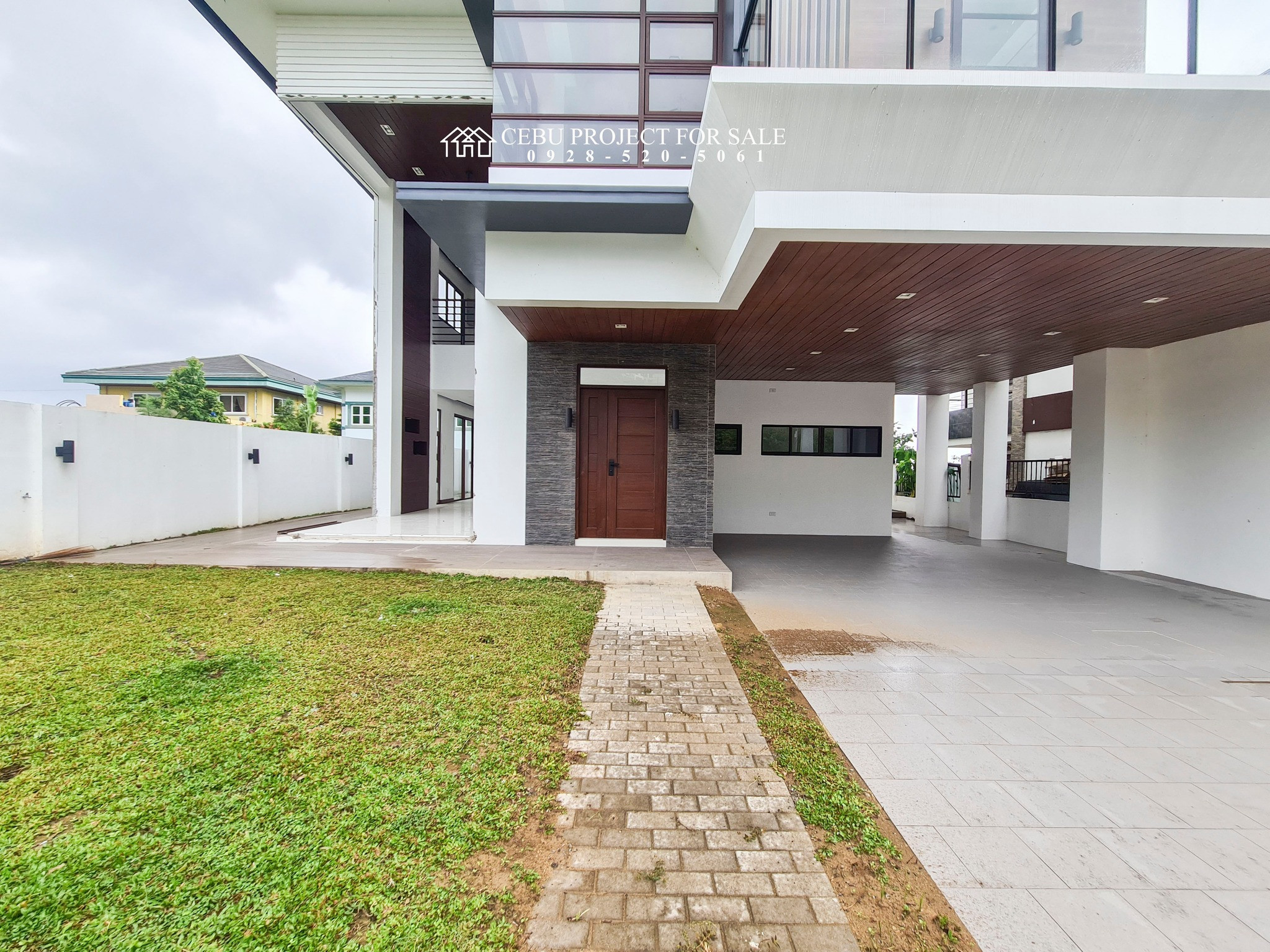 2-Storey Modern Tropical House Design in Talisay Cebu photo 2
