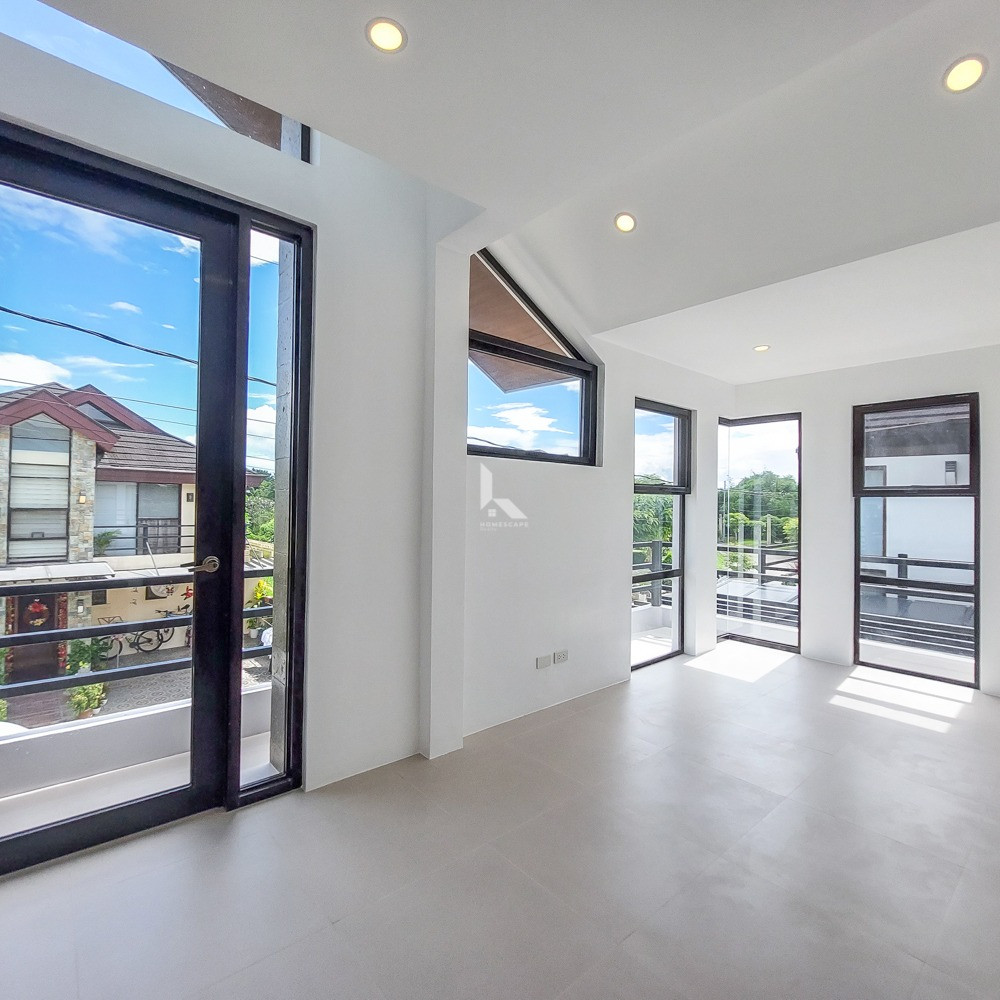 Modern 2 storey house for sale designed with captivating large windows photo 5