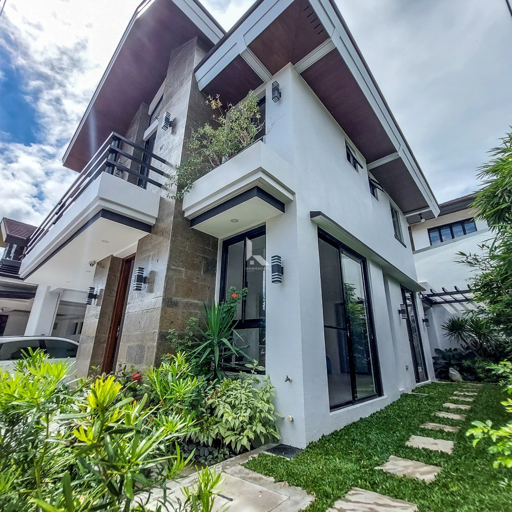Modern 2 storey house for sale designed with captivating large windows photo 1