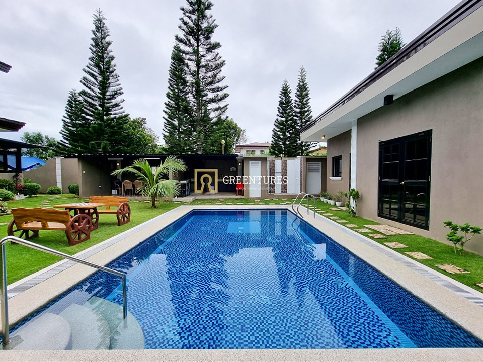 Modern Wooden Log Inspired Theme House and Lot with Swimming Pool photo 2