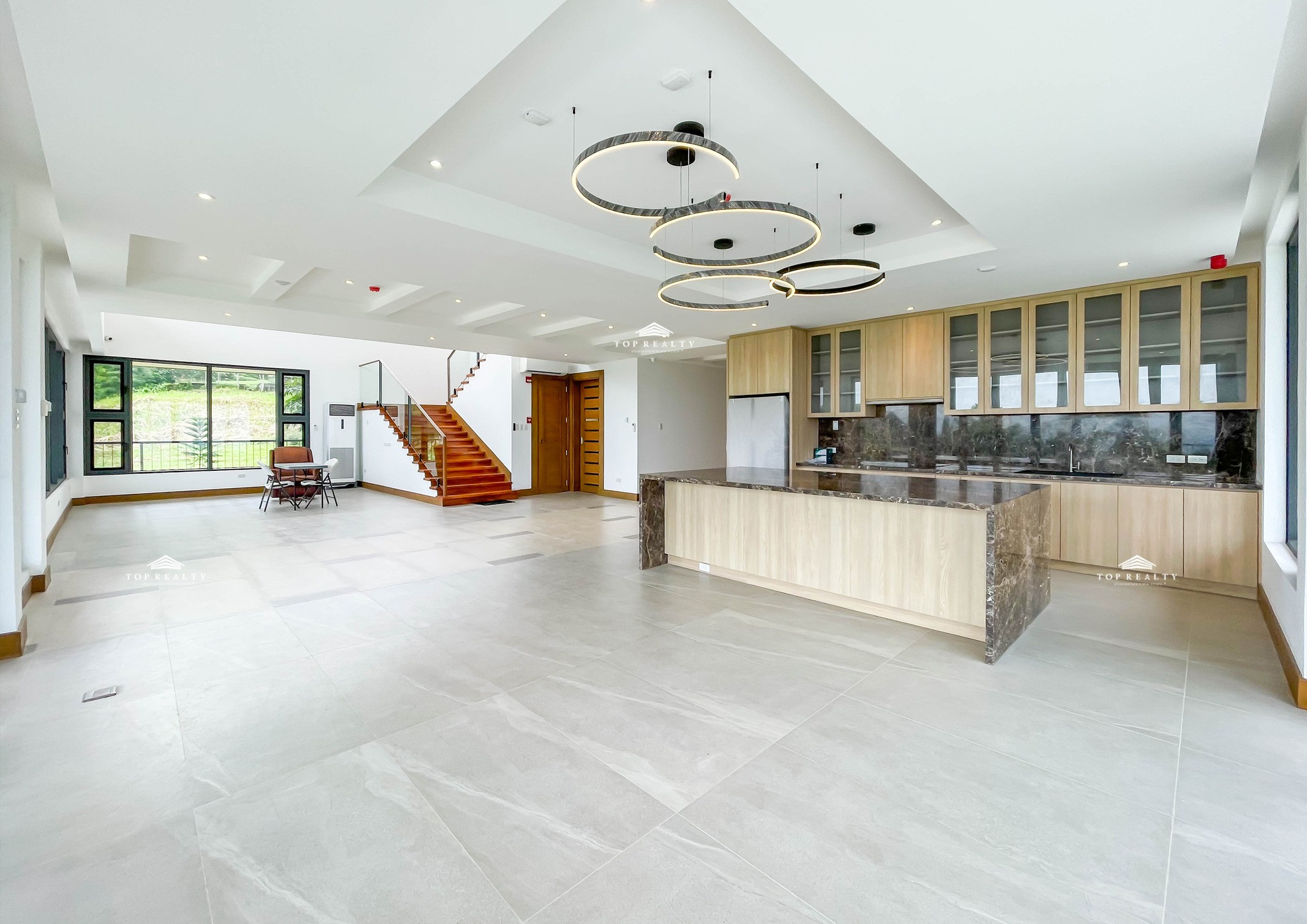 This semi-furnished house and lot boasts unobstructed views of Taal Volcano photo 2