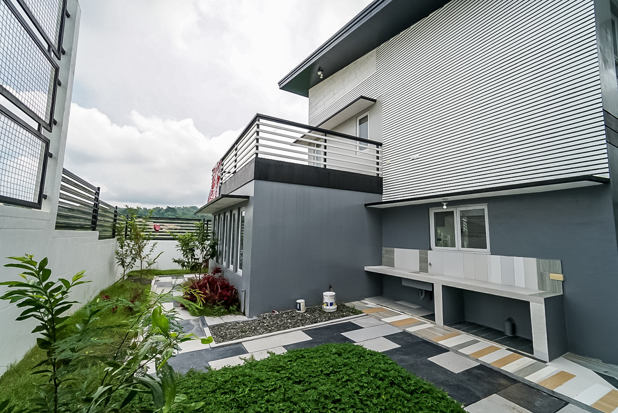 5bedroom house standing on a 432sqm lot features an impressive facade photo 3