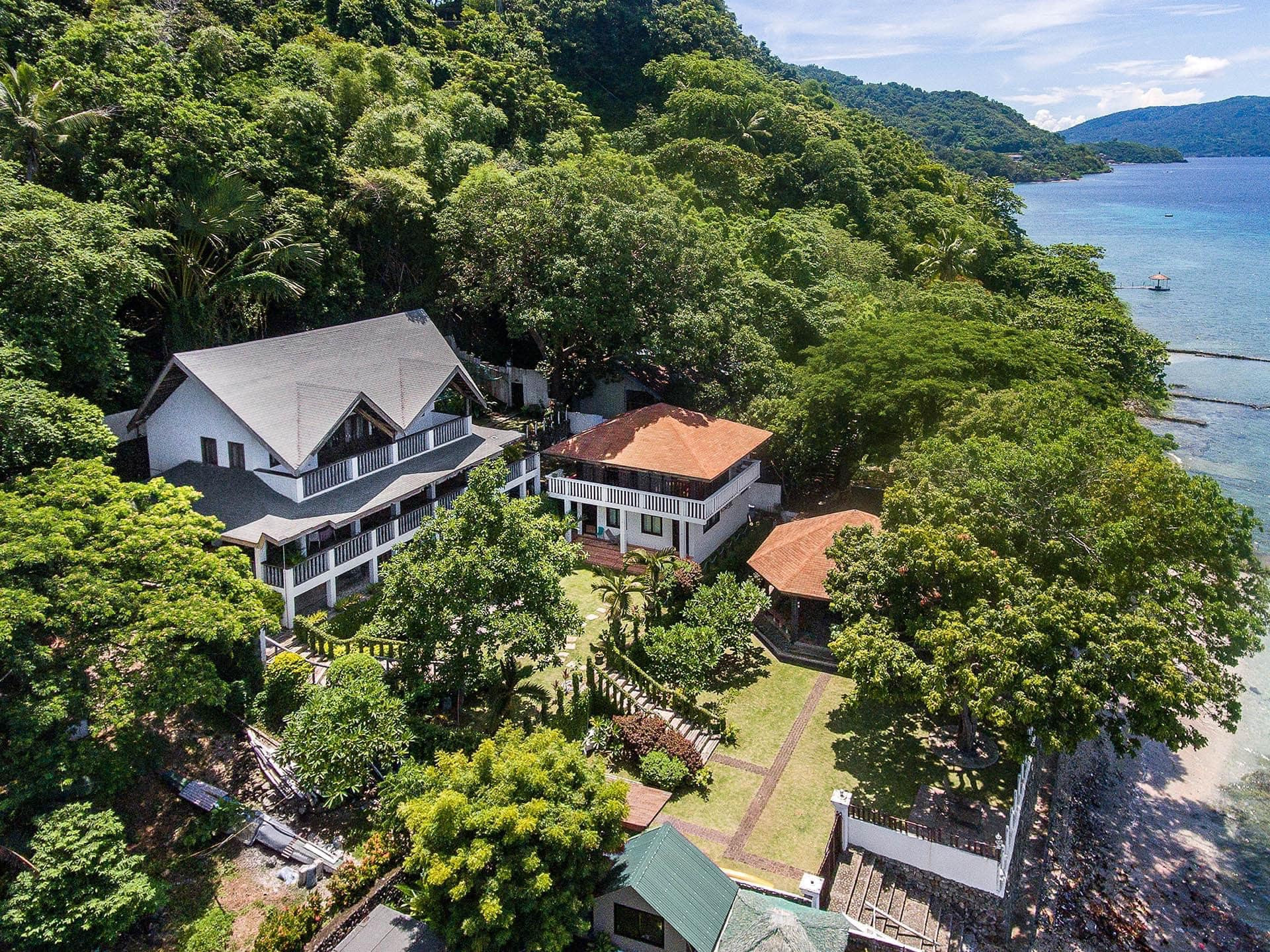 An Astounding White Beachfront Resthouse for Sale in Batangas photo 2