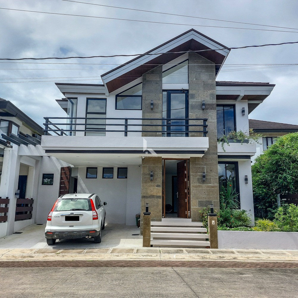 Modern 2 storey house for sale designed with captivating large windows photo 2