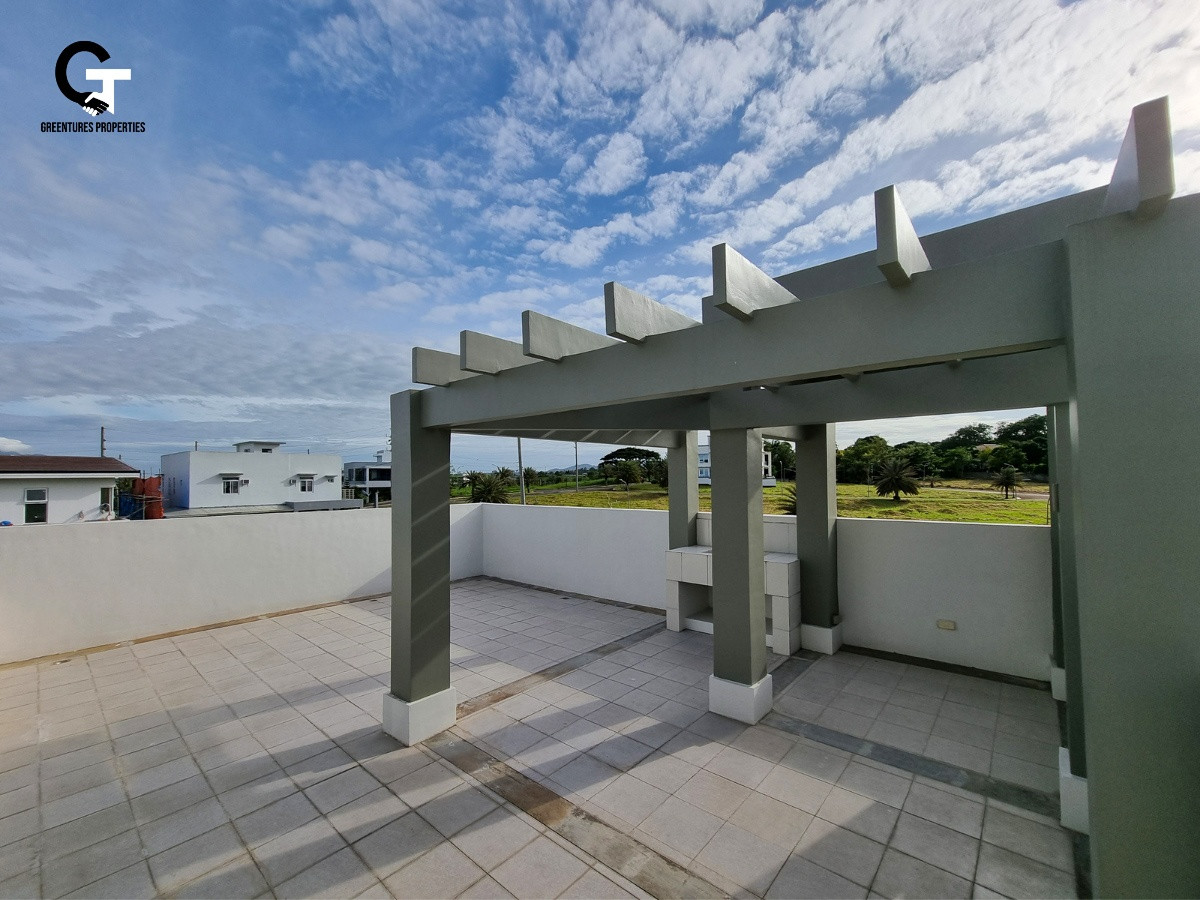Modern High Ceiling American House and Lot Design with Mt. Makiling Balcony photo 3