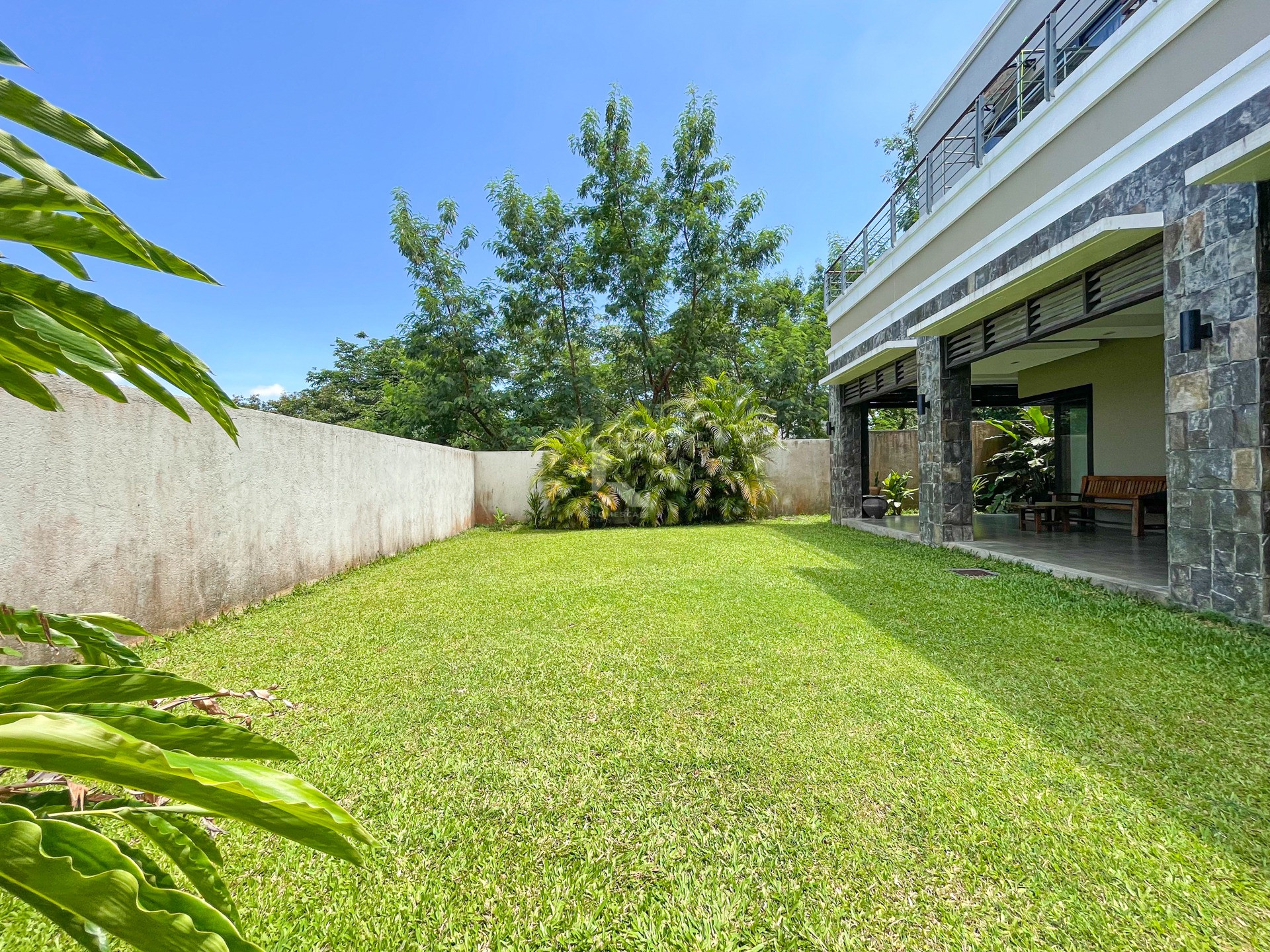 reathtaking Modern Tropical House and Lot For Sale in Ayala Greenfields photo 2