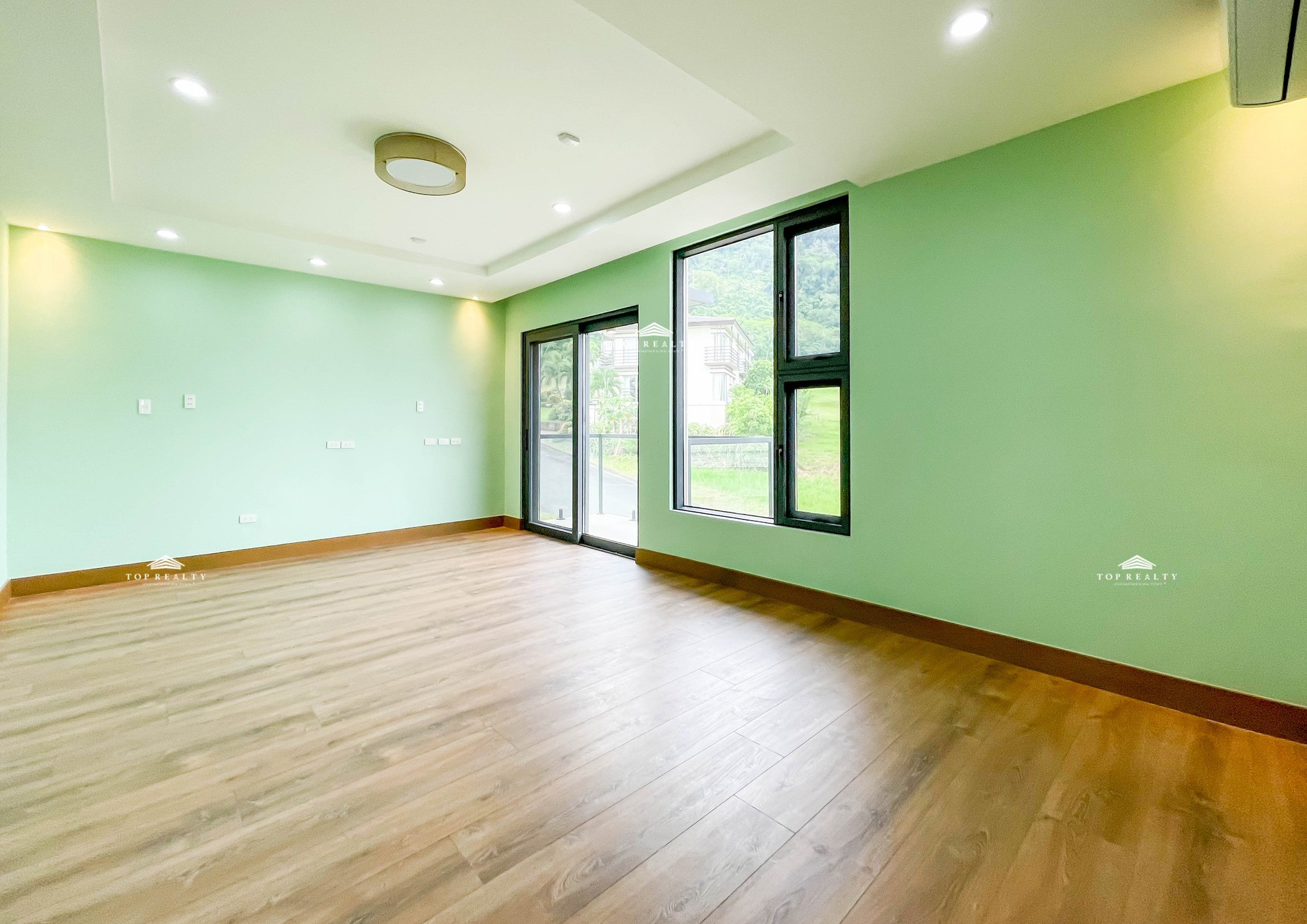 This semi-furnished house and lot boasts unobstructed views of Taal Volcano photo 4