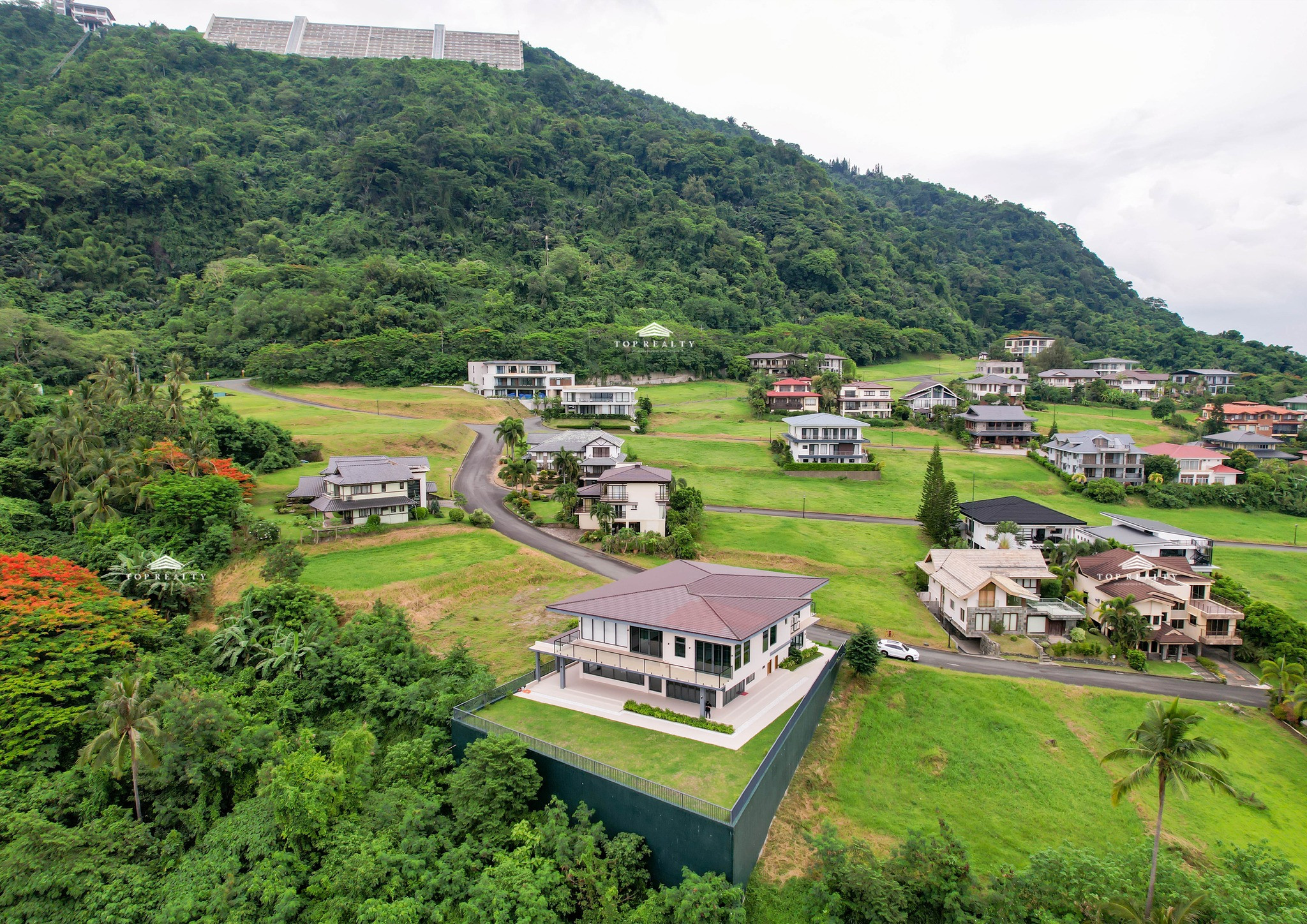 This semi-furnished house and lot boasts unobstructed views of Taal Volcano photo 1