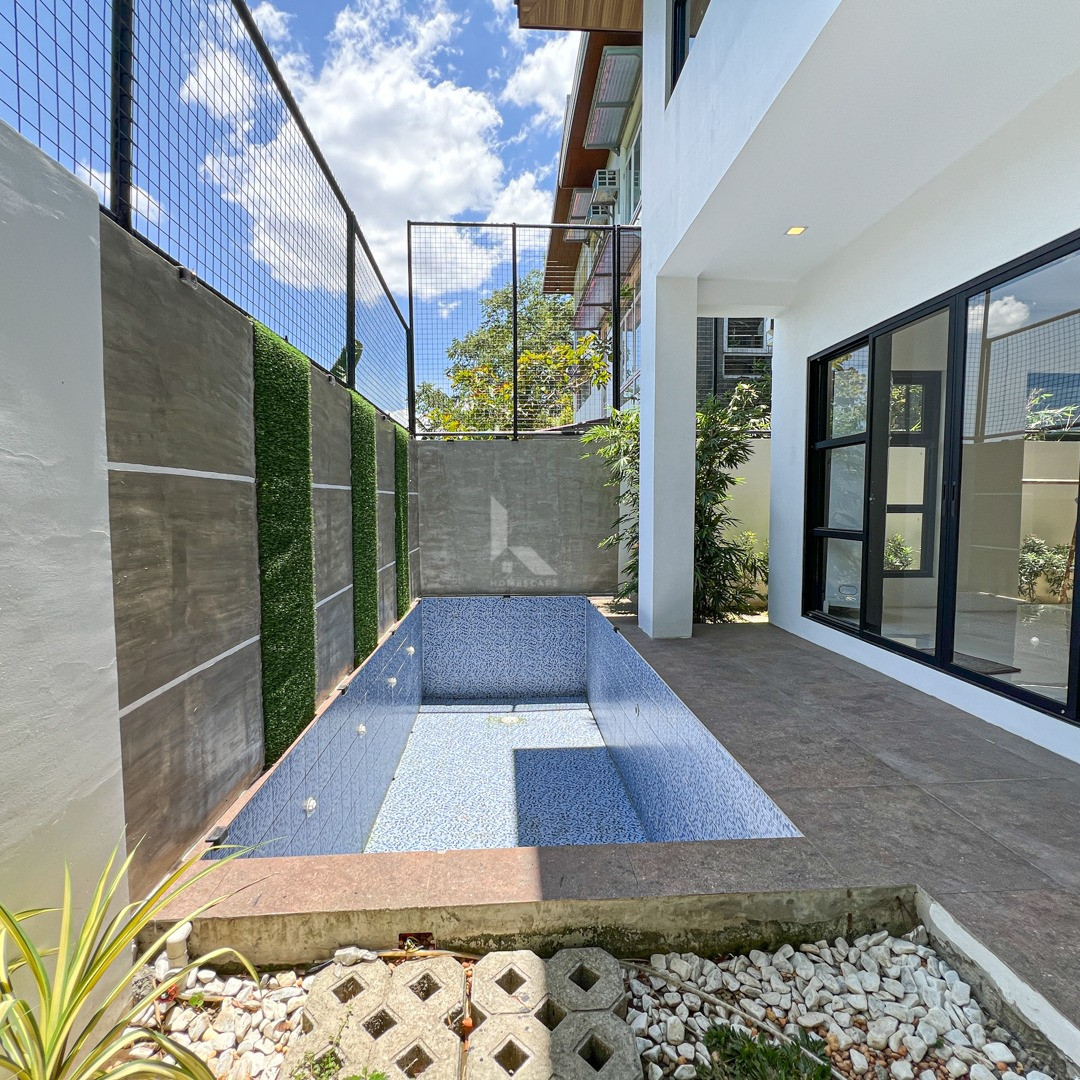Picturesque Modern Tropical House and Lot For Sale in Vista Real Classica, Quezo photo 2