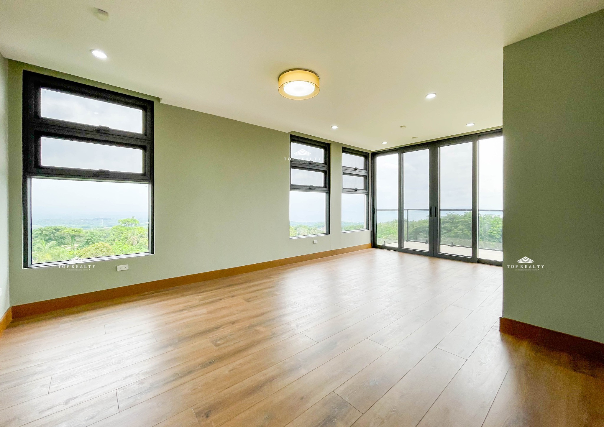 This semi-furnished house and lot boasts unobstructed views of Taal Volcano photo 5