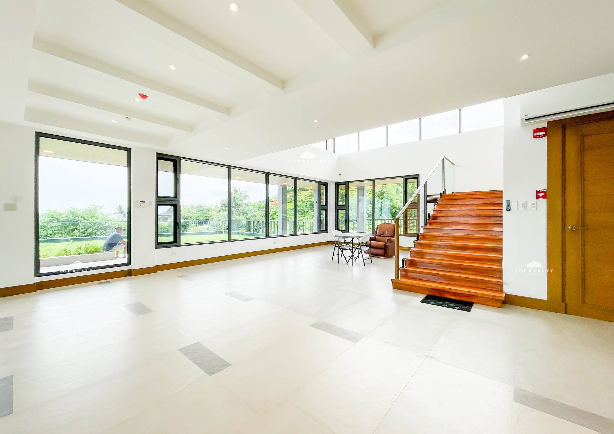 This semi-furnished house and lot boasts unobstructed views of Taal Volcano photo 3